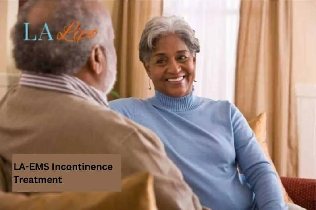 Couple sat smiling at each other - LA-EMS treatment Wincanton